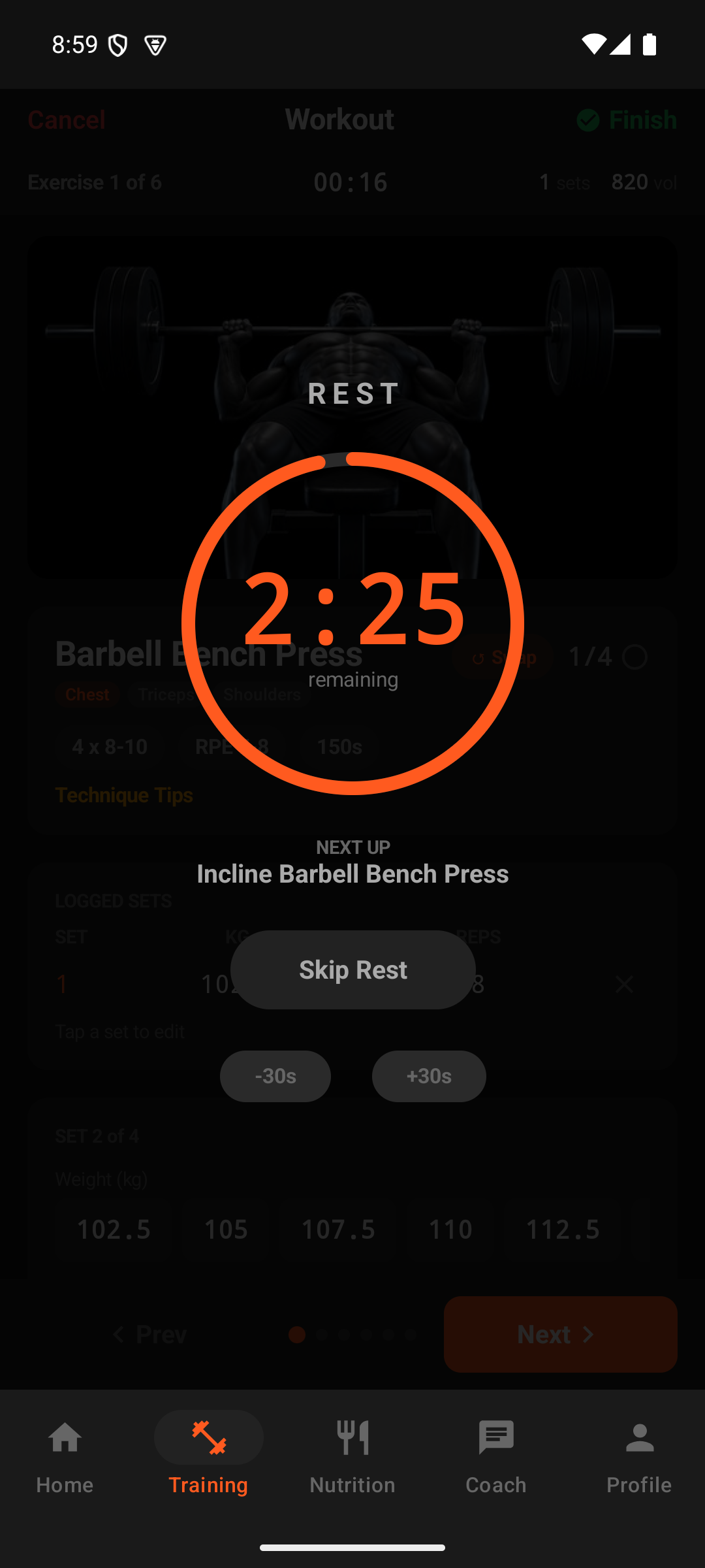 Active workout with logged sets, rest timer counting down, and the next exercise queued
